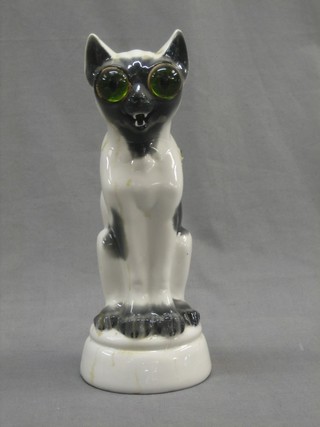 A 1930's pottery table lamp in the form of a seated cat 10"