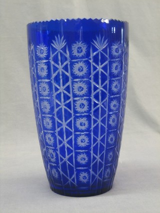 A blue cylindrical cut glass vase 10"