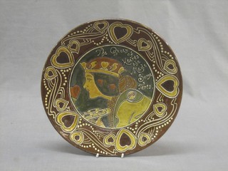 A faience plate decorated The Queen of Hearts 10"