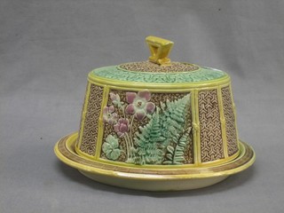 A Victorian circular Majolica cheese dish and cover (lid cracked 9")