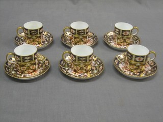 6 Royal Crown Derby porcelain cups and saucers with Imari pattern decoration