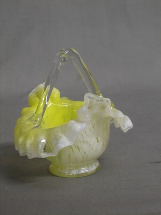 A yellow Vaseline glass basket 5" 30-50