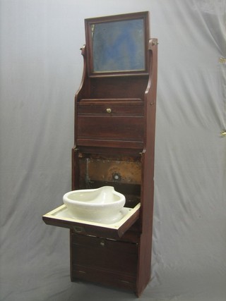 A 19th Century mahogany ships wash stand with mirror above, fitted a fall front with bidet cabinet 20"