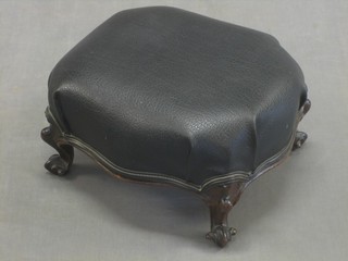 A Victorian shaped walnut stool, with black rexine seat, raised on cabriole supports 14"