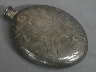 A Victorian oval engraved Britannia metal hip flask