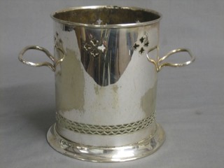 A pierced silver plated twin handled soda siphon holder