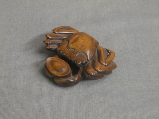A modern wooden Netsuke in the form of a crab 2"