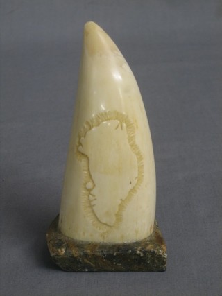 An carved ivory section of tusk carved a map of Ceylon 4"