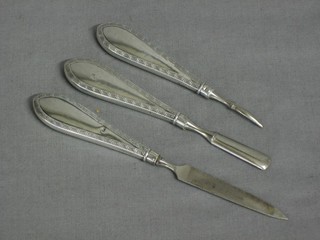 3 pairs of silver handled manicure implements