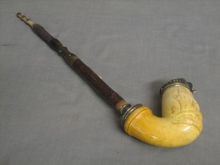A 19th Century carved Meerschaum pipe, the bowl carved a hare and a hound