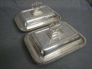 A handsome pair of rectangular silver plated entree dishes and covers