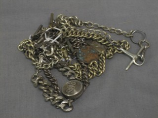 A silver flat link bracelet and a collection of watch chains