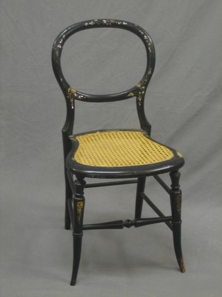 A Victorian papier mache balloon back bedroom chair with woven cane seat (f and r)