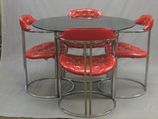 A 1950's 5 piece chromium plated dining room suite, comprising circular table with plated glass top and 4 tub back chairs upholstered in red buttoned material