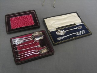 A silver plated 2 piece christening set and a set of 6 silver plated teaspoons and tongs, cased