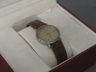 A gentleman's Omega Constellation wristwatch, cased 