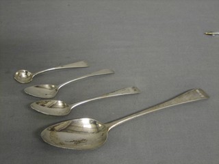 A George III silver fiddle pattern table spoon, 2 Georgian teaspoons and a Georgian mustard spoon