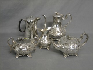 A 4 piece Britannia metal tea/coffee service with thistle decoration and a do. hotwater jug