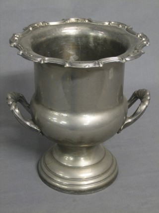 A silver plated twin handled wine cooler