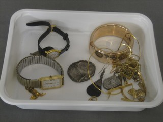 A silver locket, a lady's Raymond Weil wristwatch and a small collection of costume jewellery