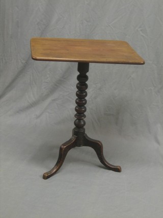 A Victorian rectangular mahogany snap top wine table, raised on a pillar and tripod base 31" 