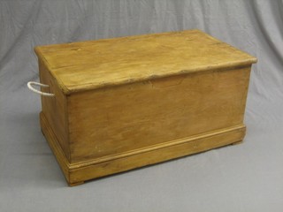 A 19th Century pine trunk with hinged lid 36"