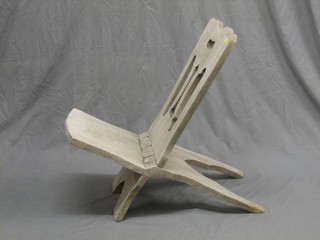 A 19th Century bleached oak Gothic style folding chair