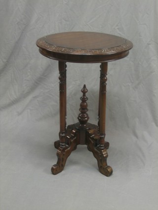 A Victorian style carved circular mahogany occasional table, raised on 4 turned supports 20"