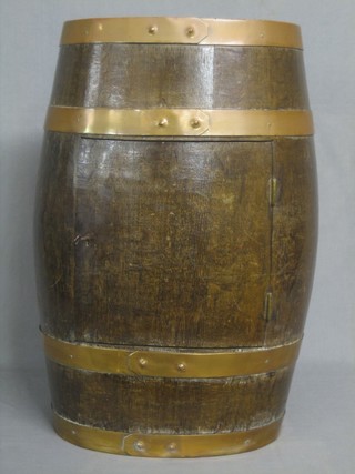 A drinks cabinet in the form of an oval coopered barrel 15"
