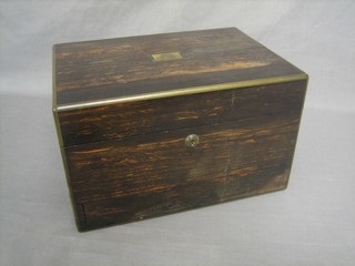 A Victorian Coromandel vanity box with hinged lid, the interior fitted glass bottles and with secret drawer 13"