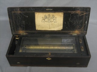 A 19th Century cylinder musical box with 12 1/2" cylinder playing 10 aires, contained in an inlaid rosewood case
