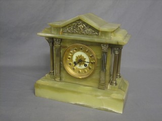 A Victorian French 8 day striking mantel clock with gilt dial and Roman numerals, contained in a green onyx architectural case, the dial marked C R Pyre of Lowestoft