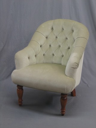 A Victorian style tub back chair upholstered in green material