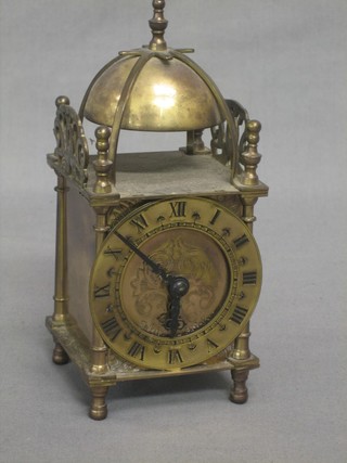 A Smiths reproduction 18th Century lantern clock contained in a brass case 3"