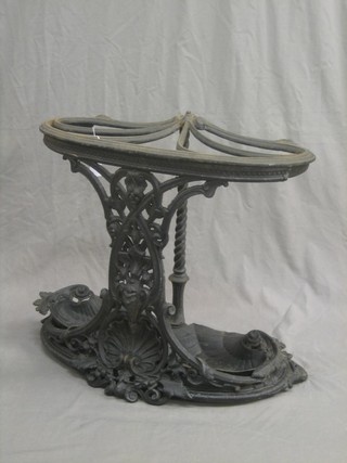A Victorian style black painted iron umbrella stand 26"