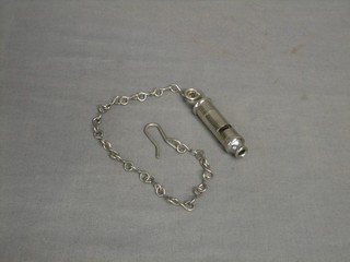 A Police style whistle and chain marked Metropolitan 
