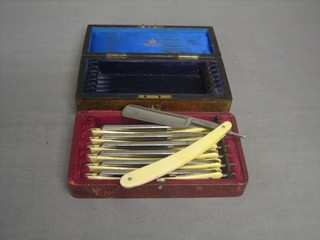 7 cut throat razors by Kropp, marked Sunday to Monday, contained in a leather case together with a rectangular Victorian walnut 7 day razor box by Mappin
