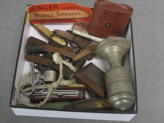 A Continental table lighter, 3 pocket knives and other curios