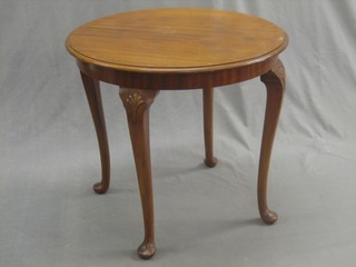 A circular Queen Anne style mahogany coffee table, raised on cabriole supports 24"