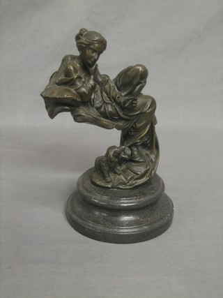 An Art Nouveau style bronze figure of a seated lady 10"