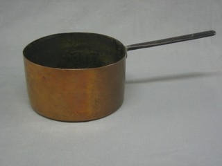 A 19th Century copper saucepan with iron handle
