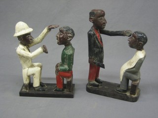 2 Eastern carved wooden models of barbers 12"