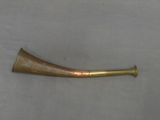 A copper and brass hunting horn