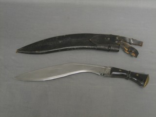 A Kukri with 12" blade and leather scabbard