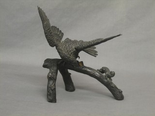 A Japanese bronze figure of an eagle on a branch with monkey 8"