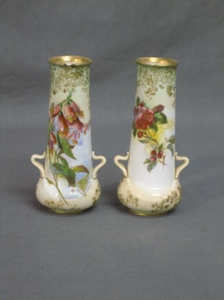 A pair of Doulton Burslem twin handled vases with floral decoration, the bases marked Doulton Burslem England, 6" (1f)