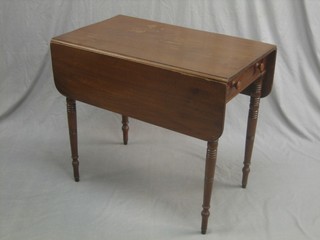 A 19th Century mahogany Pembroke table fitted a frieze drawer and raised on turned supports 30"