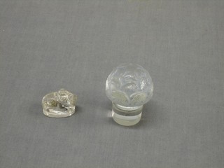A Lalique glass bottle stopper decorated fish 2" together with a glass figure of a crouching pig? 1"
