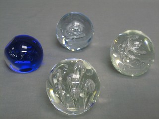 3 circular clear glass paperweights with faceted roundel decoration and 1 other Bristol blue paperweight 3"