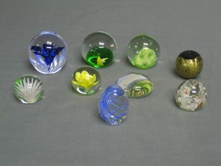 An Isle of Wight glass paperweight, a Victorian paperweight decorated Sandgate and 7 others